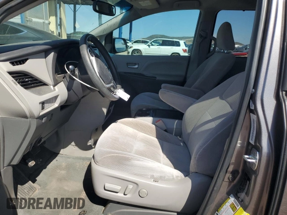 2017 Toyota Sienna LE Auto Access Seat with VIN 5TDKZ3DC0HS887015, listed as a Copart auction lot 52879705 with 114,939 mi miles and Salvage Title. Bid and sale history available at DreamBid. Image 7.