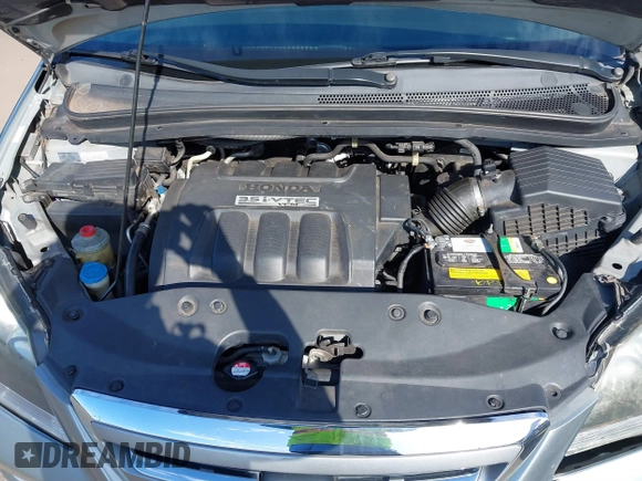2007 Honda Odyssey EX-L with VIN 5FNRL38677B021464, listed as a IAAI auction lot 41568582 with 131,359 mi miles and . Bid and sale history available at DreamBid. Image 10.