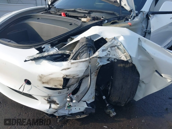 2021 Tesla Model 3 Long Range with VIN 5YJ3E1EB0MF009965, listed as a IAAI auction lot 41478233 with 31,713 mi miles and . Bid and sale history available at DreamBid. Image 19.