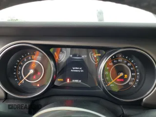 2019 Jeep Wrangler Sport S with VIN 1C4GJXAG0KW608696, listed as a Copart auction lot 57963455 with 51,955 mi miles and Salvage title. Bid and sale history available at DreamBid. Image 9.