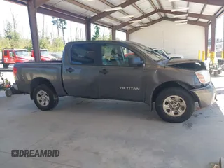 2005 Nissan Titan LE with VIN 1N6AA07B05N572685, listed as a IAAI auction lot 42692229 with 200,583 mi miles and . Bid and sale history available at DreamBid. Image 13.