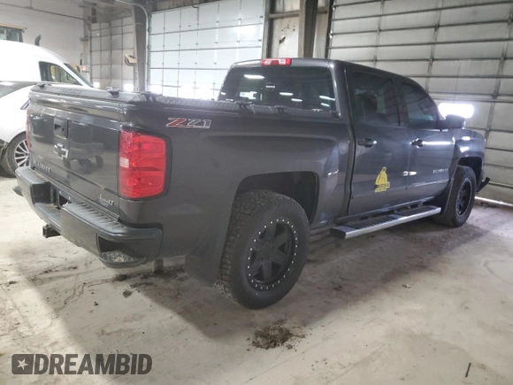 2016 Chevrolet Silverado 1500 LT with VIN 3GCUKRECXGG236034, listed as a Copart auction lot 51754255 with 205,670 mi miles and Salvage Title. Bid and sale history available at DreamBid. Image 3.