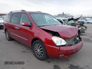 2012 Kia Sedona EX with VIN KNDMH4C76C6463143, listed as a IAAI auction lot 41990970 with 214,045 mi miles. Bid and sale history available at carsss.com. Image 1.