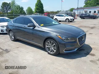 2018 Genesis G80 3.8L z VIN KMHGN4JE1JU253478, wystawiony jako IAAI lot #42066296 z przebiegiem 84 226 mil mil oraz . Historia ofert i sprzedaży dostępna na DreamBid. Obrazek 1.