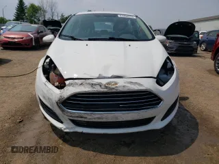 2015 Ford Fiesta SE z VIN 3FADP4EJ7FM169000, wystawiony jako Copart lot #64402674 z przebiegiem 191 221 mil mil oraz Szkoda całkowita • Salvage title. Historia ofert i sprzedaży dostępna na DreamBid. Obrazek 5.
