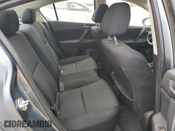 2012 Mazda 3 i Sport z VIN JM1BL1UF2C1504181, wystawiony jako Copart lot #56019085 z przebiegiem 181 946 mil mil oraz Szkoda całkowita • Salvage title. Historia ofert i sprzedaży dostępna na DreamBid. Obrazek 10.