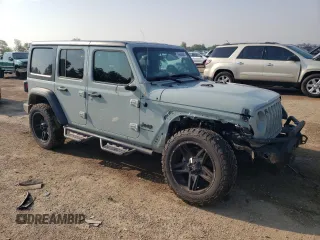 2023 Jeep Wrangler Willys with VIN 1C4HJXDG9PW615072, listed as a Copart auction lot 59606805 with 72,969 mi miles and Salvage title. Bid and sale history available at DreamBid. Image 4.