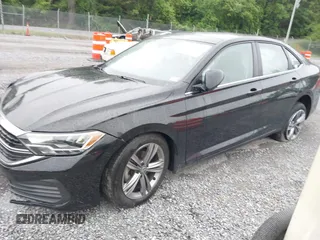 2023 Volkswagen Jetta SE z VIN 3VW7M7BUXPM061694, wystawiony jako IAAI lot #42231342 z przebiegiem 39 063 mil mil oraz . Historia ofert i sprzedaży dostępna na DreamBid. Obrazek 17.