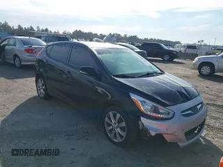 2014 Hyundai Accent SE with VIN KMHCU5AE3EU142184, listed as a IAAI auction lot 41402298 with 106,998 mi miles. Bid and sale history available at carsss.com. Image 1.