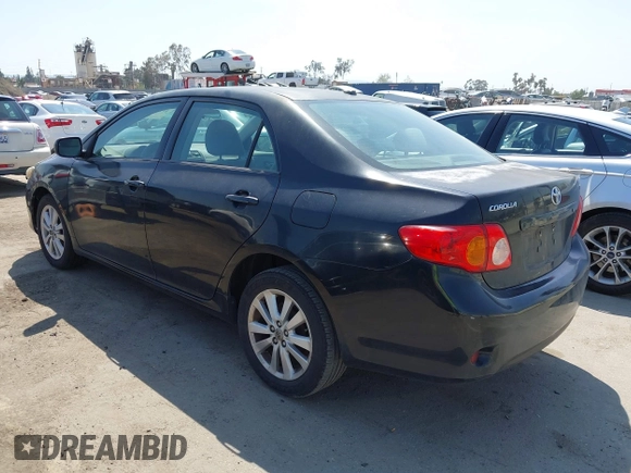 2009 Toyota Corolla with VIN 1NXBU40E89Z056754, listed as a IAAI auction lot 41989594 with 187,890 mi miles. Bid and sale history available at carsss.com. Image 3.