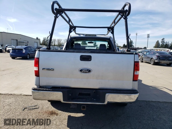 2005 Ford F-150 XL with VIN 1FTRF12235NA82990, listed as a Copart auction lot 50436745 with Not provided miles and Salvage title. Bid and sale history available at DreamBid. Image 6.