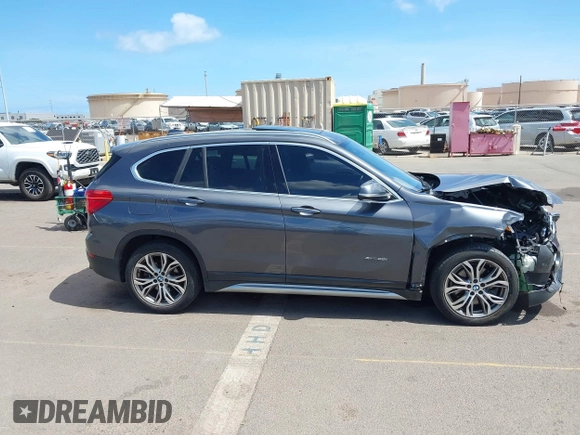 2017 BMW X1 xDrive28i with VIN WBXHT3Z31H4A56113, listed as a IAAI auction lot 42397932 with 70,252 mi miles and . Bid and sale history available at DreamBid. Image 14.