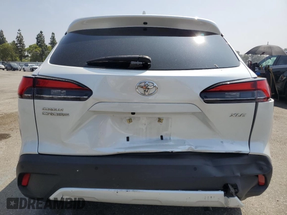 2023 Toyota Corolla Cross XLE with VIN 7MUDAAAG2PV042957, listed as a Copart auction lot 60301555 with 39,211 mi miles and Salvage title. Bid and sale history available at DreamBid. Image 6.