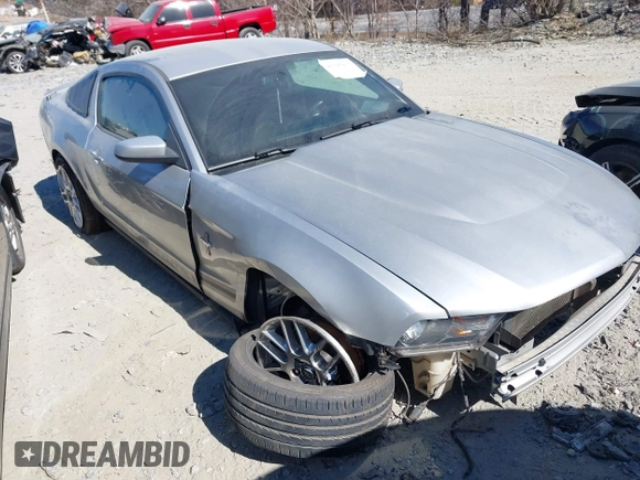 2012 Ford Mustang V6 Premium with VIN 1ZVBP8AM1C5265745, listed as a IAAI auction lot 41705931 with 145,000 mi miles. Bid and sale history available at carsss.com. Image 1.