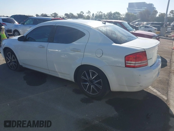 2010 Dodge Avenger SXT with VIN 1B3CC4FB6AN108889, listed as a IAAI auction lot 41049789 with 127,405 mi miles. Bid and sale history available at carsss.com. Image 3.