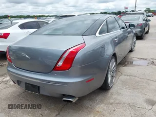 2012 Jaguar XJ XJL with VIN SAJWA2GB5CLV23903, listed as a IAAI auction lot 42486443 with 109,691 mi miles and . Bid and sale history available at DreamBid. Image 4.