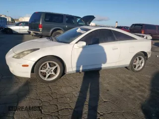 2000 Toyota Celica GTS with VIN JTDDY32T6Y0019229, listed as a Copart auction lot 77842174 with 143,514 mi miles and Salvage Title. Bid and sale history available at carsss.com. Image 1.
