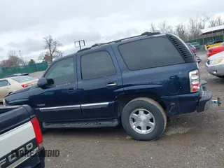 2005 GMC Yukon SLT with VIN 1GKEC13T45J139885, listed as a IAAI auction lot 41796394 with 229,494 mi miles. Bid and sale history available at carsss.com. Image 14.
