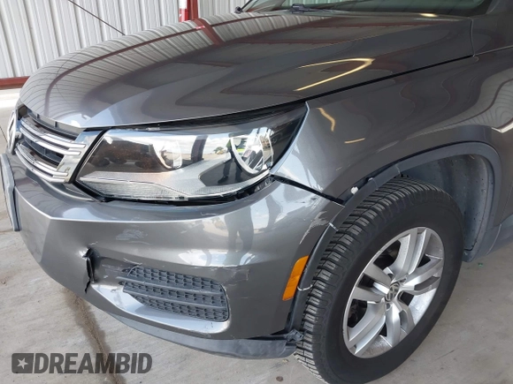 2012 Volkswagen Tiguan SEL with VIN WVGAV7AX1CW004744, listed as a IAAI auction lot 41924952 with 100,964 mi miles and . Bid and sale history available at DreamBid. Image 6.