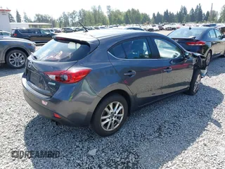 2015 Mazda 3 i Touring z VIN JM1BM1L73F1238360, wystawiony jako IAAI lot #42455285 z przebiegiem 124 319 mil mil oraz . Historia ofert i sprzedaży dostępna na DreamBid. Obrazek 4.