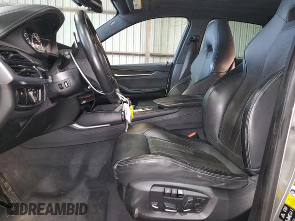 2019 BMW X6 M with VIN 5YMKW8C54KLR38377, listed as a Copart auction lot 84643024 with 47,556 mi miles and Salvage Title. Bid and sale history available at carsss.com. Image 7.