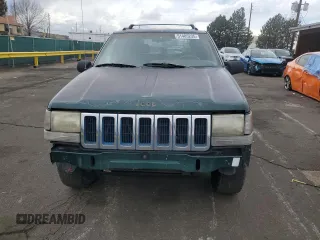 1996 Jeep Grand Cherokee Laredo with VIN 1J4GZ58S6TC165636, listed as a Copart auction lot 51485235 with 266,873 mi miles and Salvage Title. Bid and sale history available at carsss.com. Image 5.