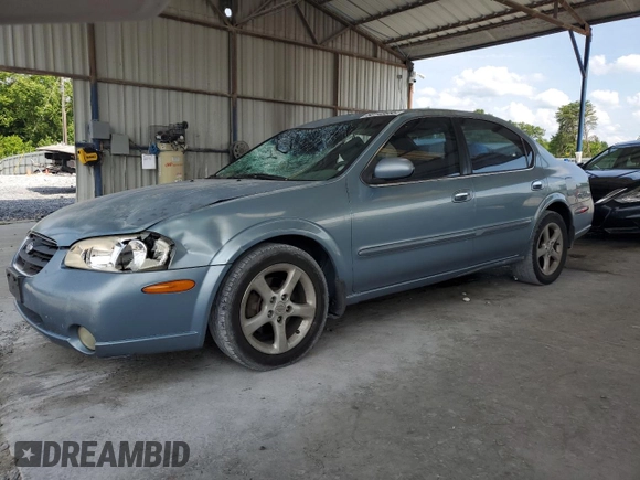 2000 Nissan Maxima GXE with VIN JN1CA31A1YT223132, listed as a Copart auction lot 60148655 with 269,258 mi miles and Salvage title. Bid and sale history available at DreamBid. Image 1.