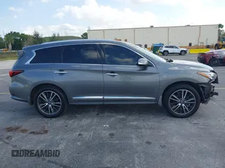 2016 Infiniti QX60 with VIN 5N1AL0MM1GC510760, listed as a IAAI auction lot 41990248 with 60,296 mi miles and . Bid and sale history available at DreamBid. Image 13.