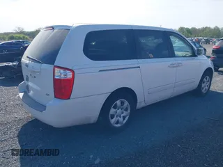 2006 Kia Sedona LX with VIN KNDMB233866052026, listed as a IAAI auction lot 42095980 with 230,320 mi miles. Bid and sale history available at carsss.com. Image 4.