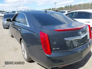 2013 Cadillac XTS Premium with VIN 2G61S5S33D9113653, listed as a IAAI auction lot 41837117 with 101,049 mi miles and . Bid and sale history available at DreamBid. Image 3.