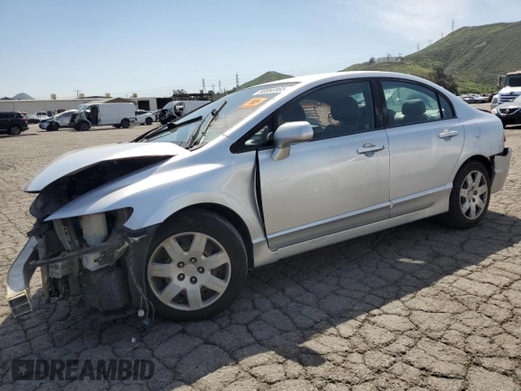 2010 Honda Civic LX with VIN 2HGFA1F57AH586100, listed as a Copart auction lot 50066965 with 192,401 mi miles and Salvage Title. Bid and sale history available at DreamBid. Image 1.