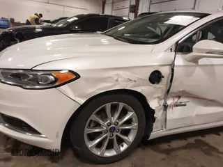 2018 Ford Fusion Energi SE with VIN 3FA6P0PU9JR264257, listed as a IAAI auction lot 41587659 with 85,832 mi miles. Bid and sale history available at carsss.com. Image 6.