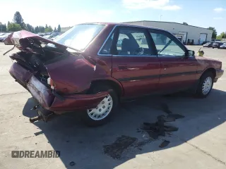 1991 Toyota Camry DLX z VIN 4T1SV21E7MU414824, wystawiony jako Copart lot #61604434 z przebiegiem 170 867 mil mil oraz Szkoda całkowita • Salvage title. Historia ofert i sprzedaży dostępna na DreamBid. Obrazek 3.