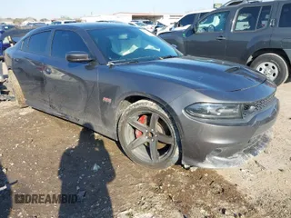 2021 Dodge Charger Scat Pack with VIN 2C3CDXGJ9MH511348, listed as a IAAI auction lot 41688349 with 56,425 mi miles and . Bid and sale history available at DreamBid. Image 1.