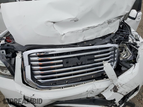 2019 GMC Yukon SLT with VIN 1GKS2BKC2KR338007, listed as a Copart auction lot 82336394 with 105,087 mi miles and Salvage Title. Bid and sale history available at carsss.com. Image 13.