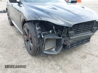 2022 Jaguar F-Pace SVR z VIN SADCZ2EE0NA702862, wystawiony jako IAAI lot #42129192 z przebiegiem 20 580 mil mil oraz . Historia ofert i sprzedaży dostępna na DreamBid. Obrazek 18.
