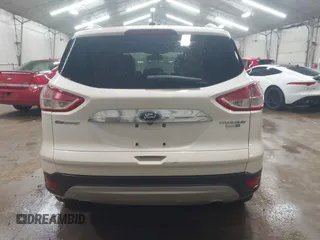 2014 Ford Escape Titanium with VIN 1FMCU9J90EUD21552, listed as a IAAI auction lot 42102148 with 183,539 mi miles. Bid and sale history available at carsss.com. Image 16.