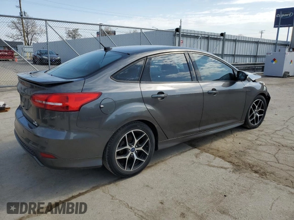 2015 Ford Focus SE z VIN 1FADP3F29FL340350, wystawiony jako Copart lot #53466455 z przebiegiem 146 374 mil mil oraz Szkoda całkowita • Salvage title. Historia ofert i sprzedaży dostępna na DreamBid. Obrazek 3.