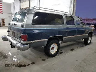 1987 GMC Suburban z VIN 1GKGV26K8HF534817, wystawiony jako Copart lot #43368215 z przebiegiem 82 553 mil mil oraz Tytuł czysty. Historia ofert i sprzedaży dostępna na DreamBid. Obrazek 3.