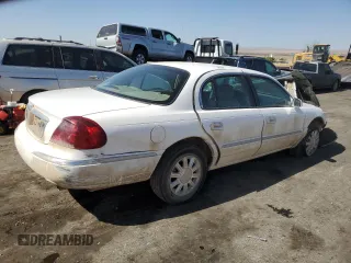 2001 Lincoln Continental z VIN 1LNHM97V31Y673523, wystawiony jako Copart lot #52451385 z przebiegiem 133 879 mil mil oraz Szkoda całkowita • Salvage title. Historia ofert i sprzedaży dostępna na DreamBid. Obrazek 3.