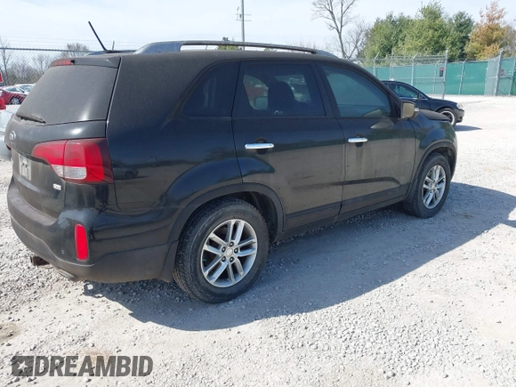 2014 Kia Sorento LX with VIN 5XYKT4A73EG482046, listed as a IAAI auction lot 41811727 with 157,845 mi miles and . Bid and sale history available at carsss.com. Image 4.