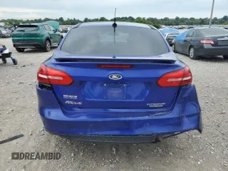 2015 Ford Focus Titanium z VIN 1FADP3J20FL299209, wystawiony jako Copart lot #67681504 z przebiegiem 98 711 mil mil oraz Nie do naprawy • Non repairable. Historia ofert i sprzedaży dostępna na DreamBid. Obrazek 6.