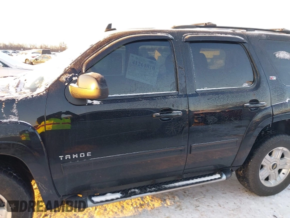 2012 Chevrolet Tahoe LT with VIN 1GNSKBE09CR295291, listed as a IAAI auction lot 41261810 with 133,400 mi miles and . Bid and sale history available at DreamBid. Image 14.