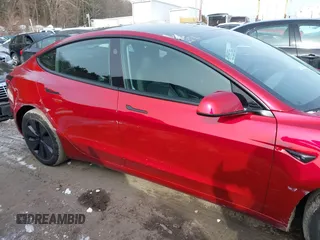 2025 Tesla Model 3 Long Range with VIN 5YJ3E1EB7SF890659, listed as a IAAI auction lot 41550353 with 1,004 mi miles and . Bid and sale history available at DreamBid. Image 14.