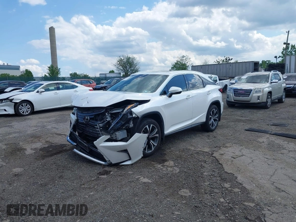 2019 Lexus RX 350 with VIN 2T2BZMCAXKC195457, listed as a IAAI auction lot 42203295 with 31,811 mi miles and . Bid and sale history available at DreamBid. Image 2.