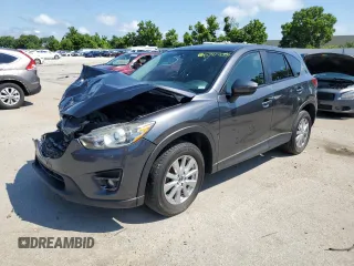 2016 Mazda CX-5 Touring с VIN JM3KE4CY6G0729608, выставлен на аукционе Copart как лот 63477055 с пробегом Не указан миль и Списание • Salvage title. История ставок и продаж доступна на DreamBid. Изображение 1.