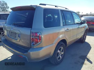 2006 Honda Pilot EX with VIN 5FNYF28416B017534, listed as a IAAI auction lot 41656789 with 241,343 mi miles and . Bid and sale history available at DreamBid. Image 4.
