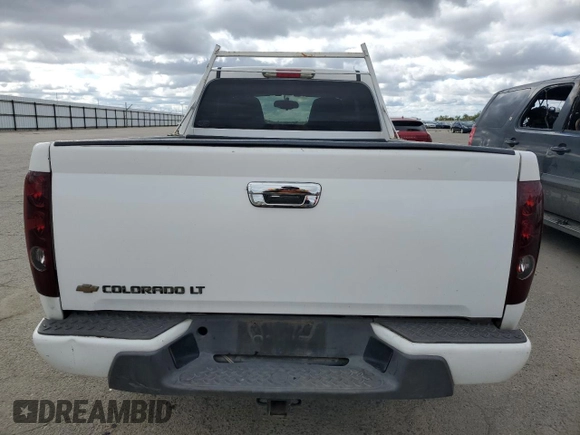 2009 Chevrolet Colorado Work Truck z VIN 1GCCS199498121661, wystawiony jako Copart lot #47581085 z przebiegiem 187 123 mil mil oraz Szkoda całkowita • Salvage title. Historia ofert i sprzedaży dostępna na DreamBid. Obrazek 6.
