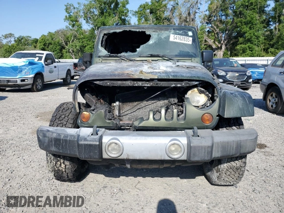2008 Jeep Wrangler Unlimited Sahara with VIN 1J4GA59138L616722, listed as a Copart auction lot 54162835 with Not Provided miles and Salvage Title. Bid and sale history available at DreamBid. Image 5.