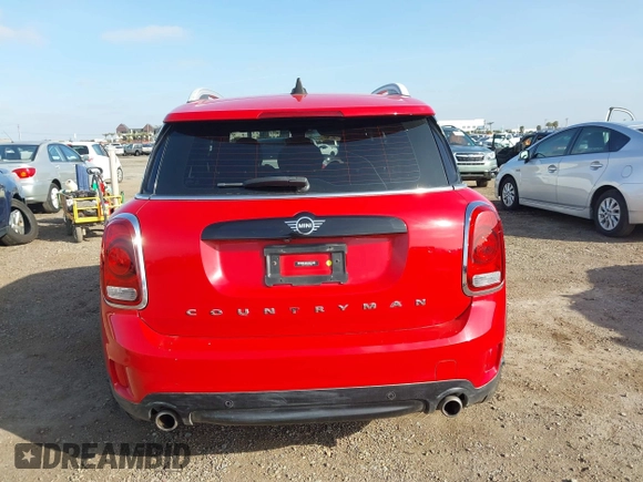 2020 MINI Countryman Cooper S with VIN WMZYW7C09L3L84725, listed as a IAAI auction lot 41599883 with 72,814 mi miles and . Bid and sale history available at DreamBid. Image 17.